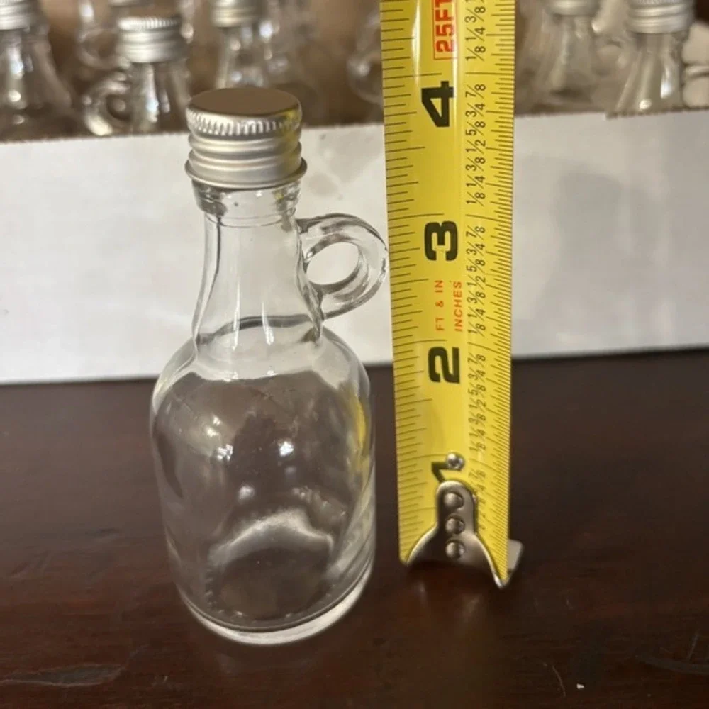 18 Pack Mini Glass Syrup Bottles with Handles and Screw Caps 4 Inch Clear Jugs